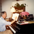 Ric composing at piano no date.jpeg